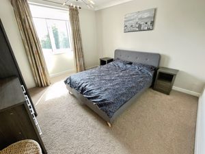 Bedroom One- click for photo gallery